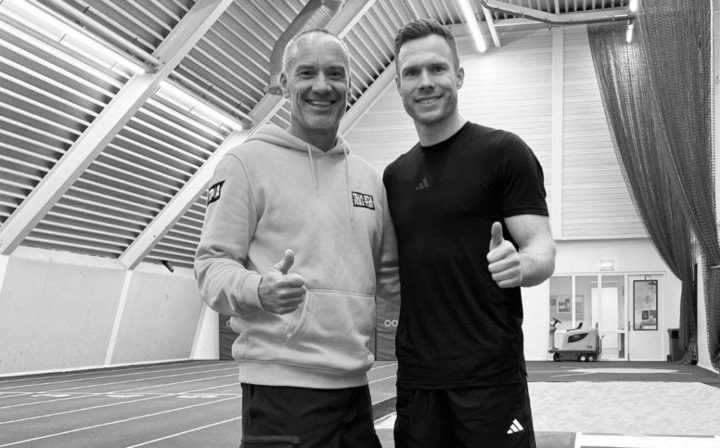 Verspringer Markus Rehm met coach Guido